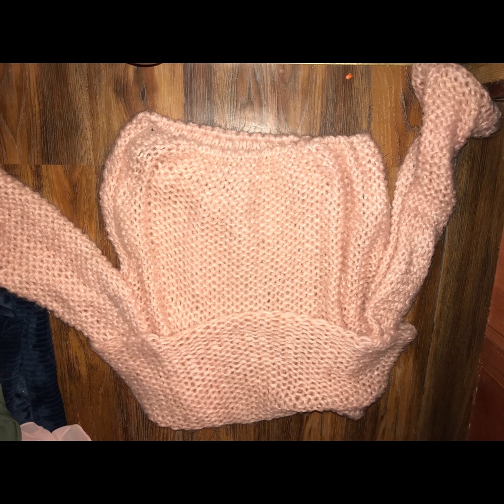Pink sweater knitted